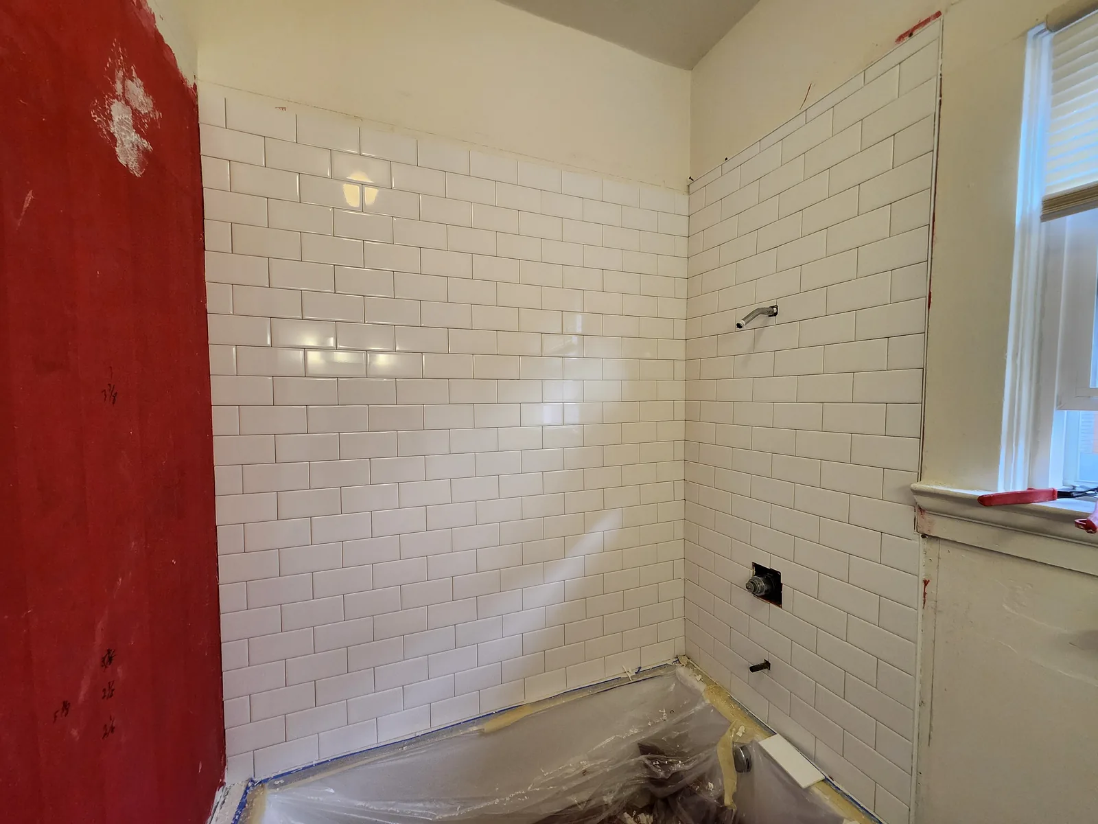 Bathroom Tile Upgrade - Paint Coat Carpentry
